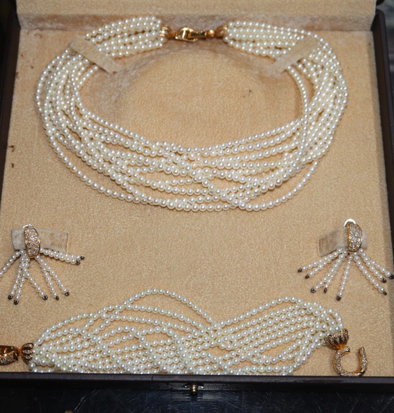 A modern gold, diamond and multi strand cultured pearl parure